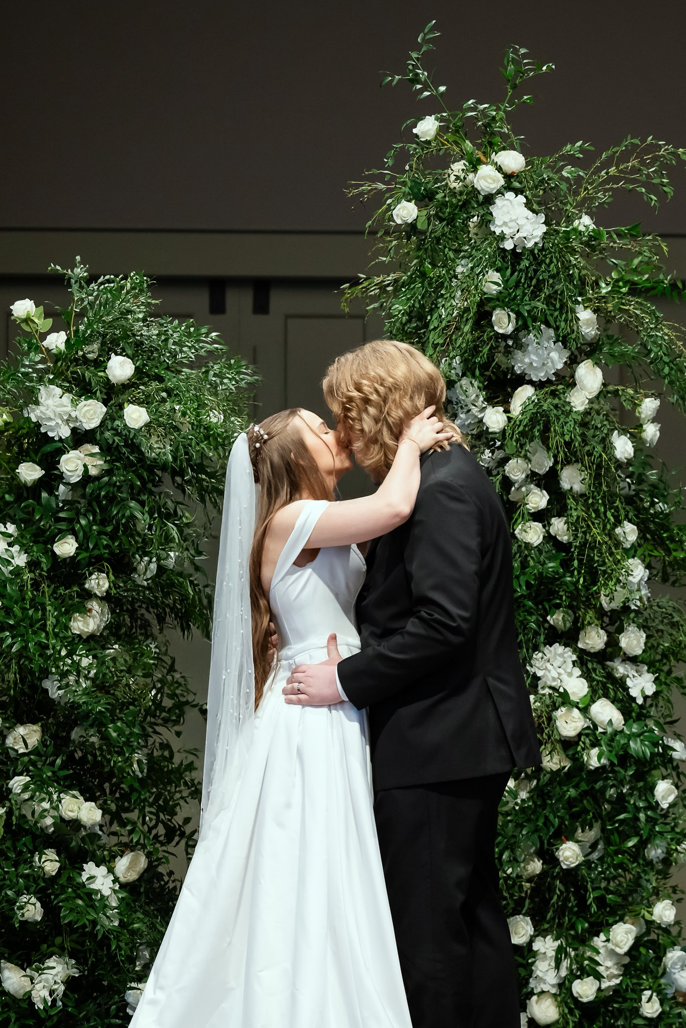 Wedding ceremony kiss
